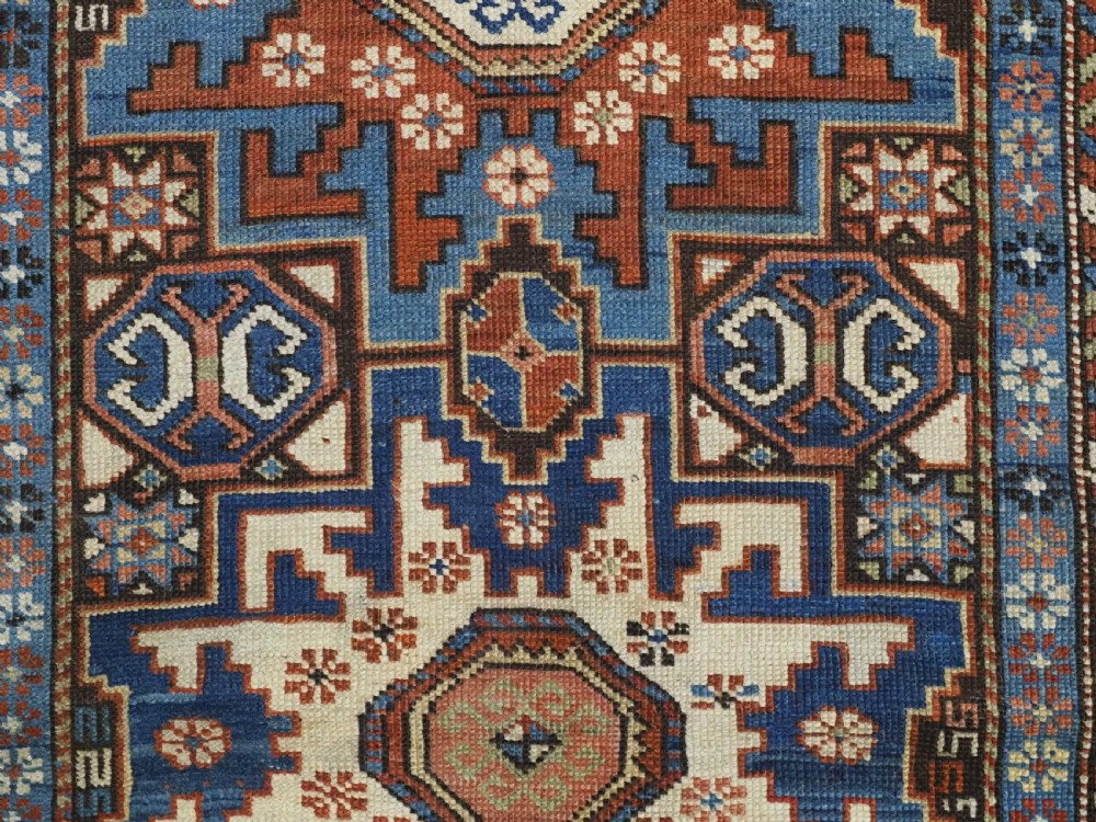 ANTIQUE CAUCASIAN RUG WITH LESGHI STAR DESIGN, EXCELLENT COLOUR, CIRCA 1890. View IX