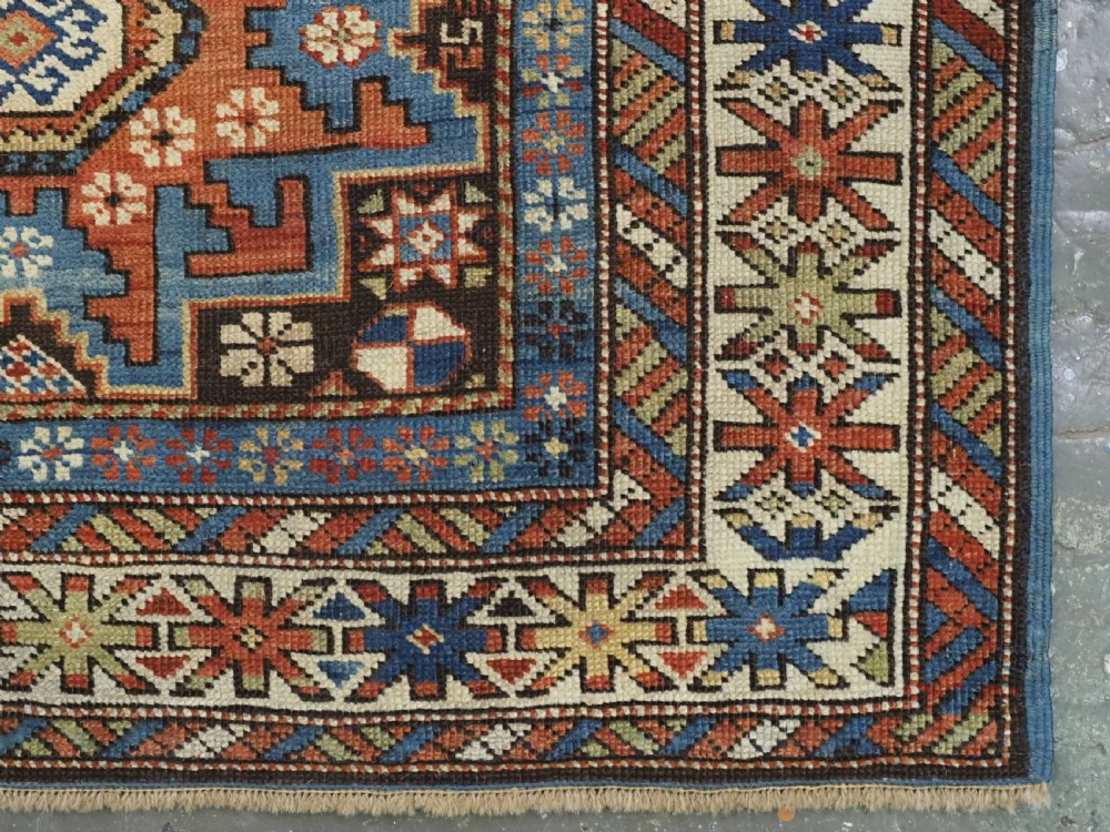 ANTIQUE CAUCASIAN RUG WITH LESGHI STAR DESIGN, EXCELLENT COLOUR, CIRCA 1890. View XII