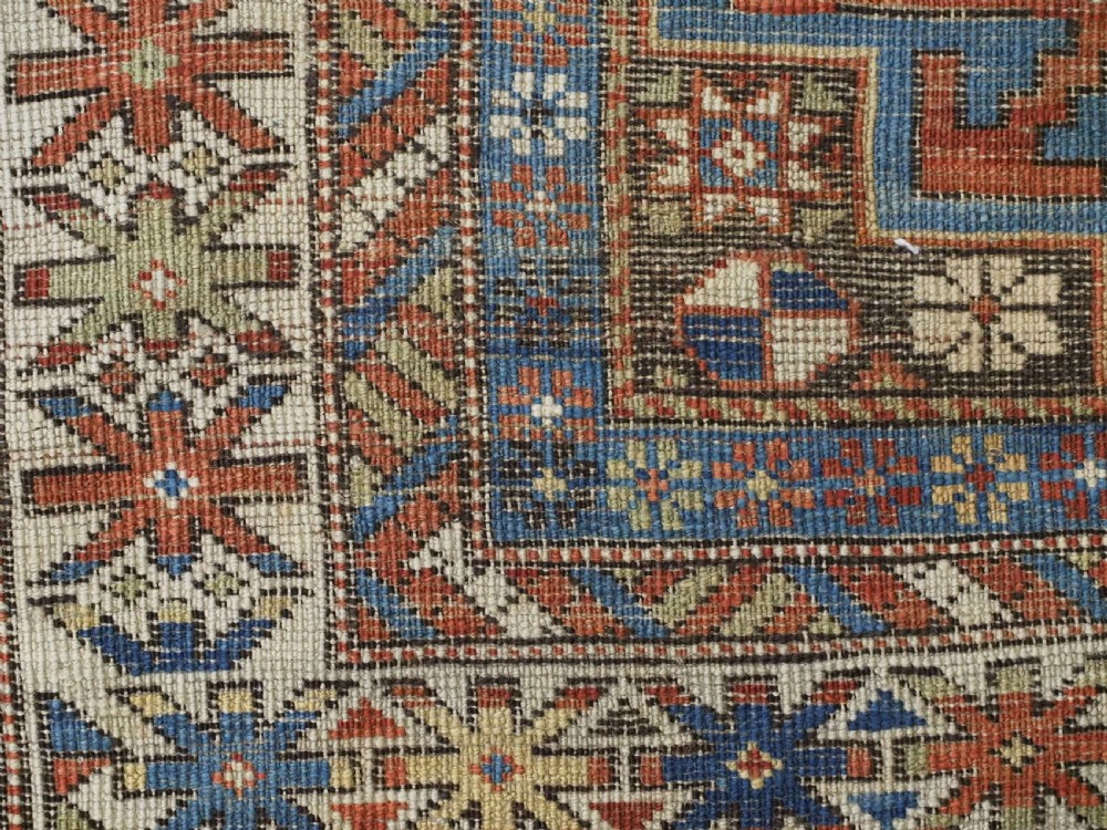 ANTIQUE CAUCASIAN RUG WITH LESGHI STAR DESIGN, EXCELLENT COLOUR, CIRCA 1890. View XIII