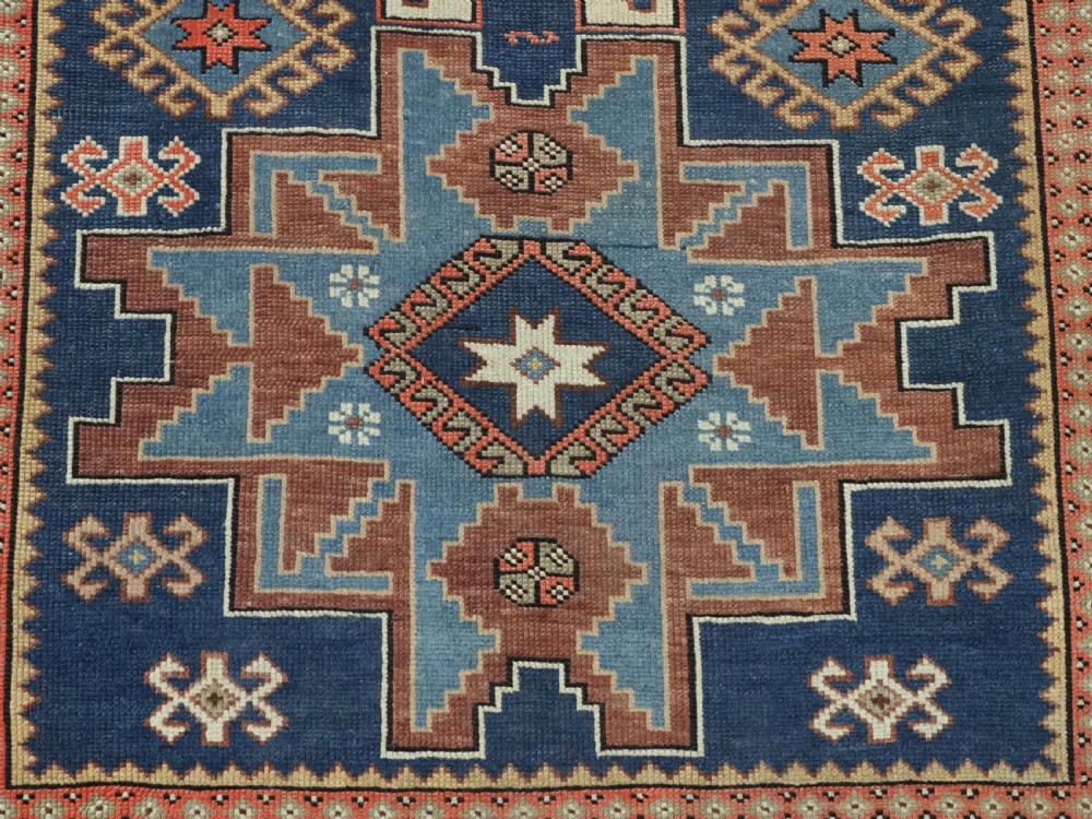 ANTIQUE CAUCASIAN LESGHI STAR DESIGN RUG, DATED 1328 / 1910. View XIII