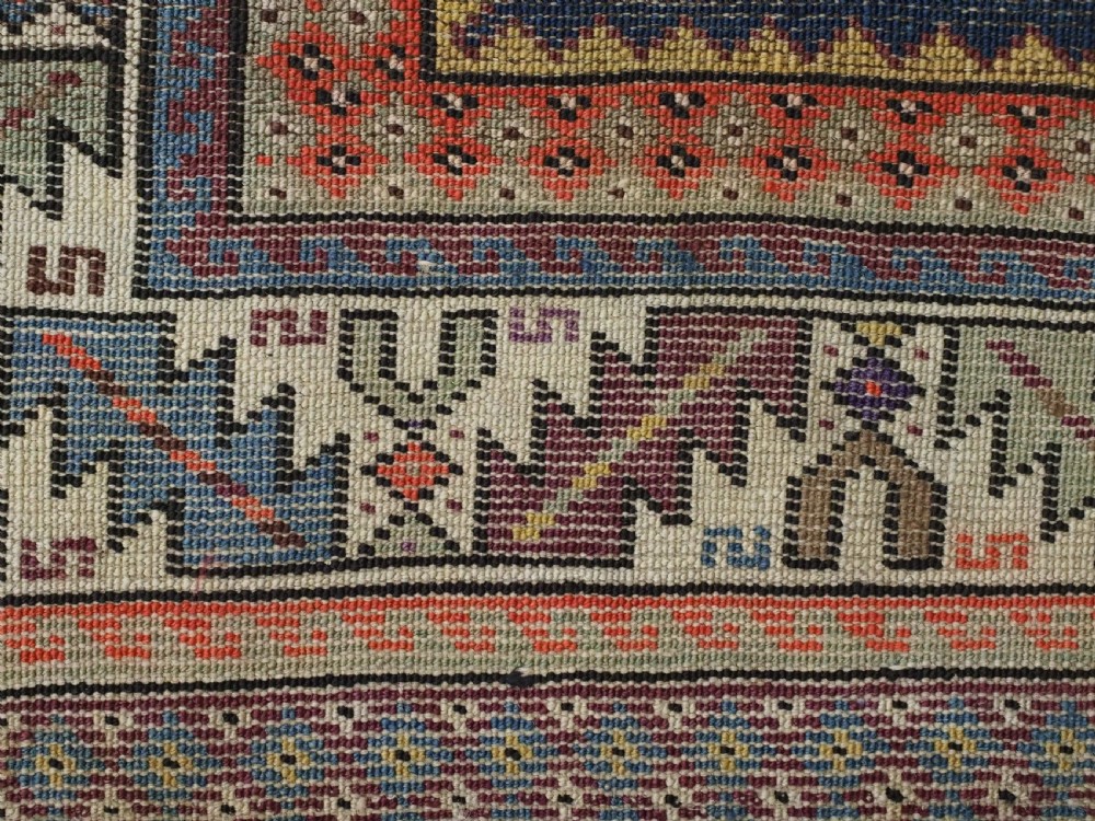 ANTIQUE CAUCASIAN LESGHI STAR DESIGN RUG, DATED 1328 / 1910. View XV