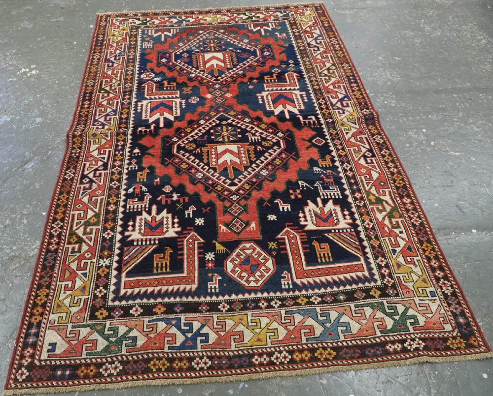 ANTIQUE CAUCASIAN SHIRVAN RUG WITH MANY INTERESTING DESIGN INFLUENCES, CIRCA 1900. View II