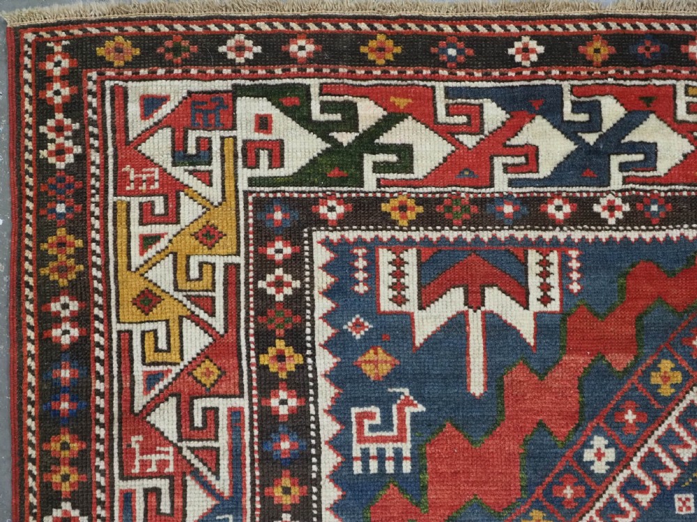 ANTIQUE CAUCASIAN SHIRVAN RUG WITH MANY INTERESTING DESIGN INFLUENCES, CIRCA 1900. View VI