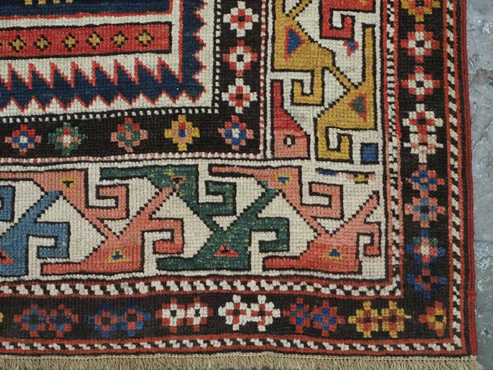ANTIQUE CAUCASIAN SHIRVAN RUG WITH MANY INTERESTING DESIGN INFLUENCES, CIRCA 1900. View XVII