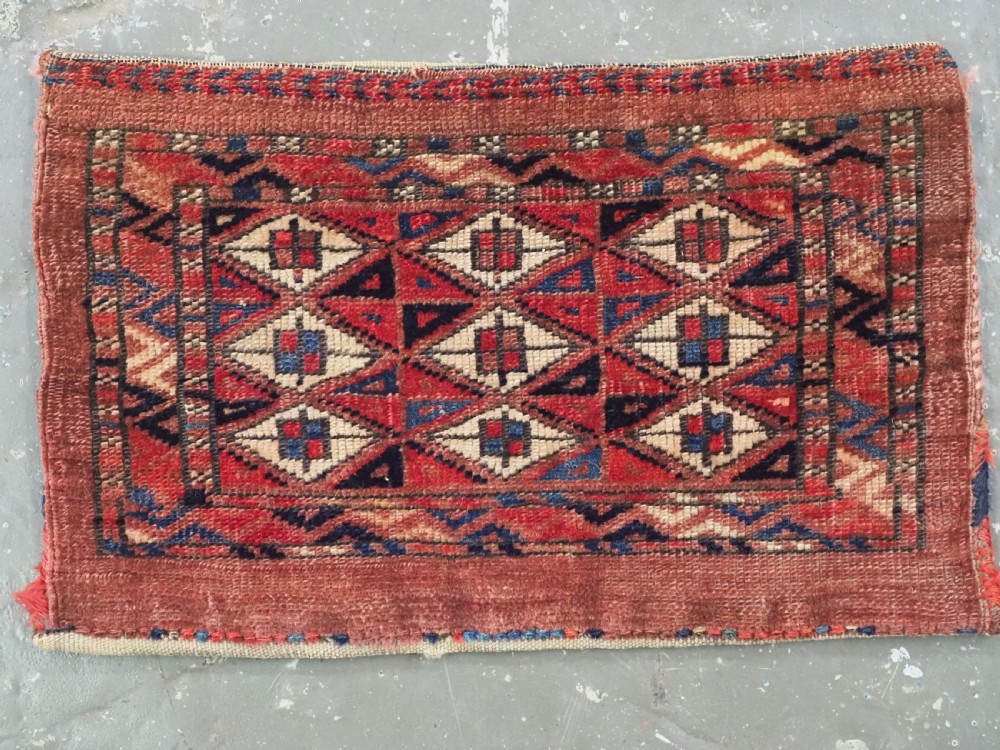 ANTIQUE YOMUT TURKMEN PAIR OF 'KAP' SMALL BAG, COMPLETE WITH BACKS, CIRCA 1880. View II