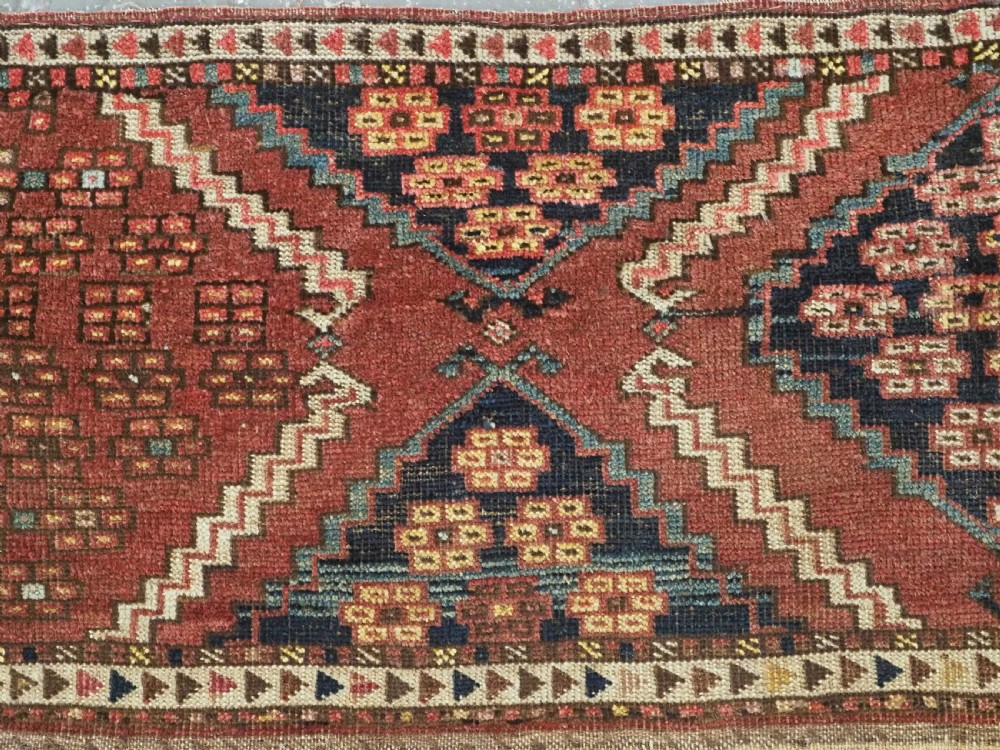 ANTIQUE ERSARI TURKMEN TORBA WITH SCARCE ERTMEN GUL DESIGN, CIRCA 1870. View V