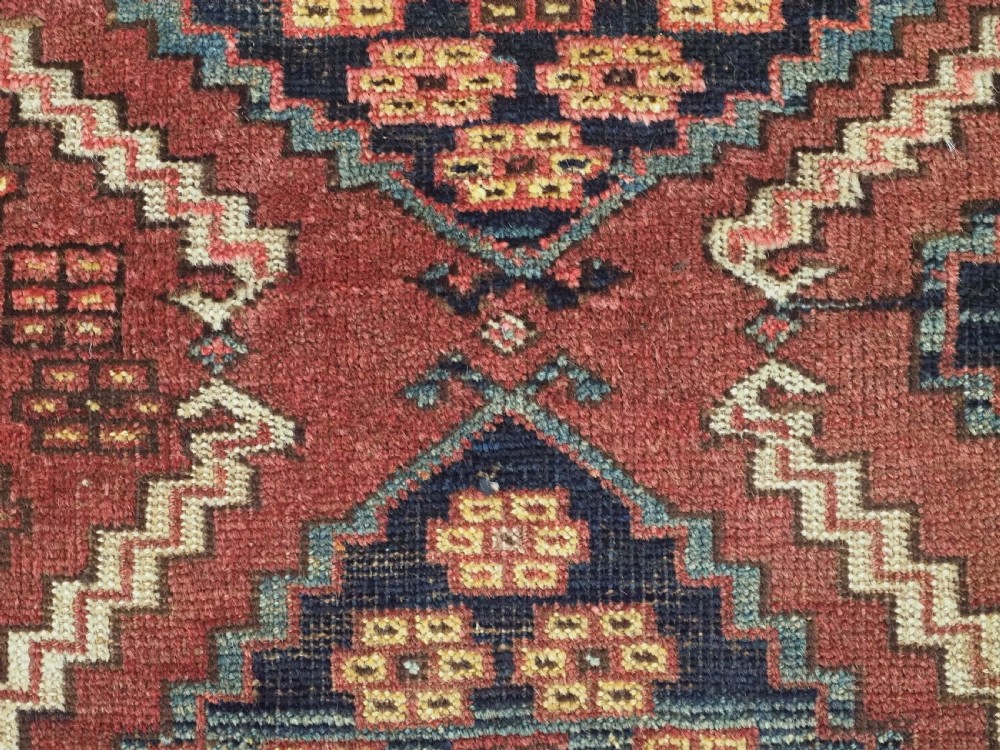 ANTIQUE ERSARI TURKMEN TORBA WITH SCARCE ERTMEN GUL DESIGN, CIRCA 1870. View IX