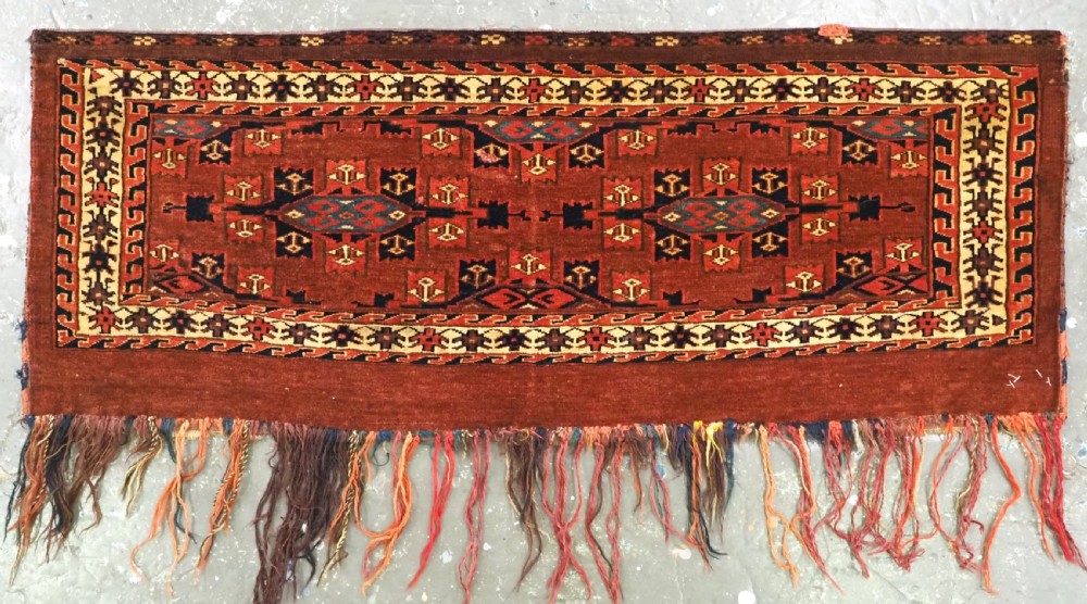 ANTIQUE YOMUT TURKMEN TORBA WITH 'KEPSE' GUL DESIGN, CIRCA 1880.