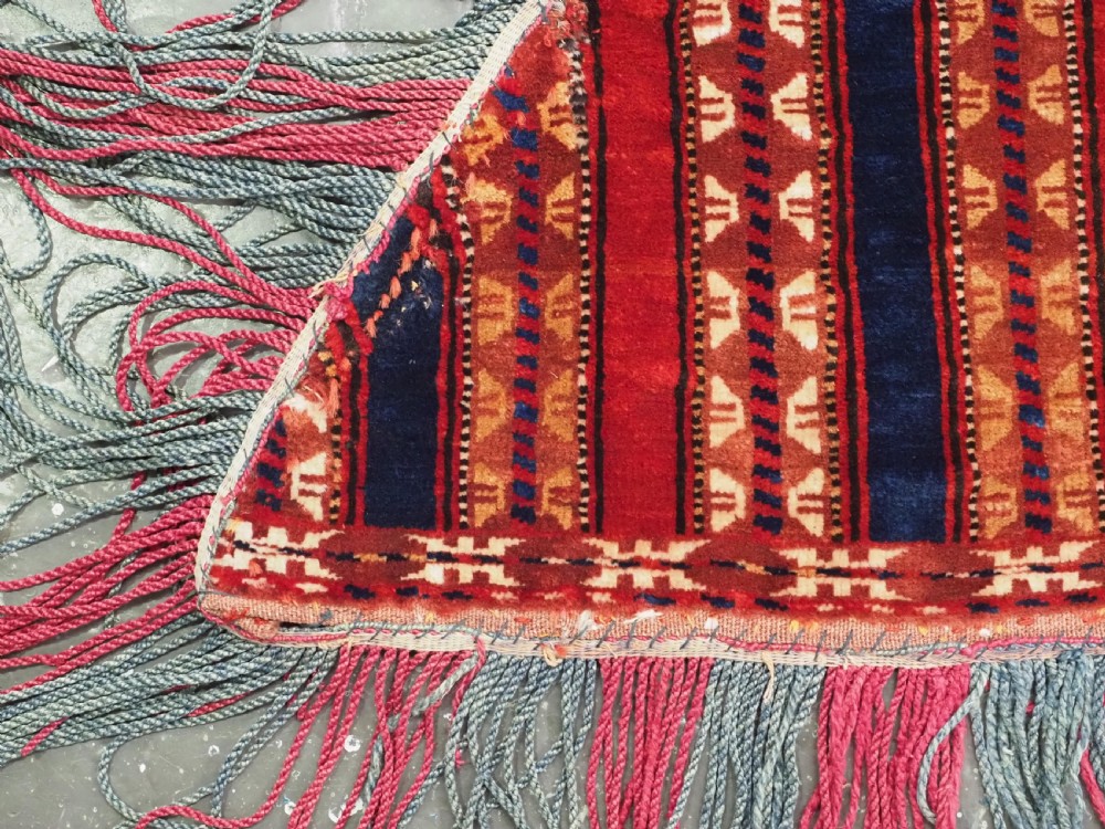 An antique Yomut Turkmen handwoven wool horse cover with vertical geometric stripes in dark blue, ivory, and terracotta red, edged with fringe trim. View VIII