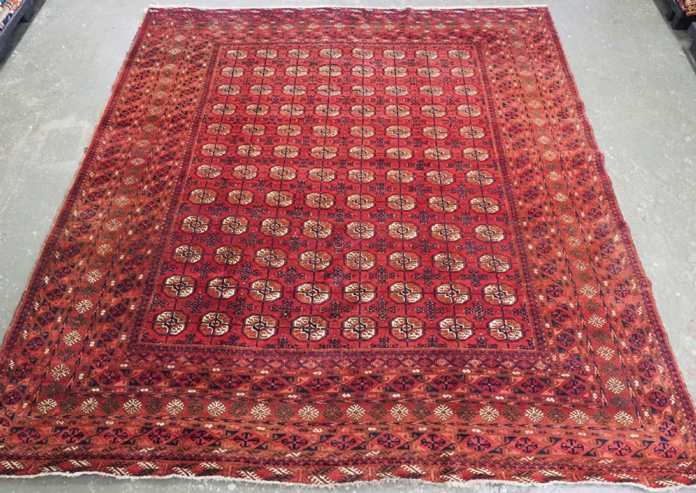 ANTIQUE AFGHAN TURKMEN CARPET, TEKKE GUL DESIGN, SQUARE SIZE & GREAT COLOUR, CIRCA 1900.