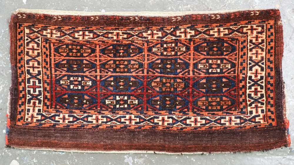 ANTIQUE YOMUT TURKMEN 'KAP' OR MAFRASH SMALL BAG, COMPLETE WITH BACK, CIRCA 1880.