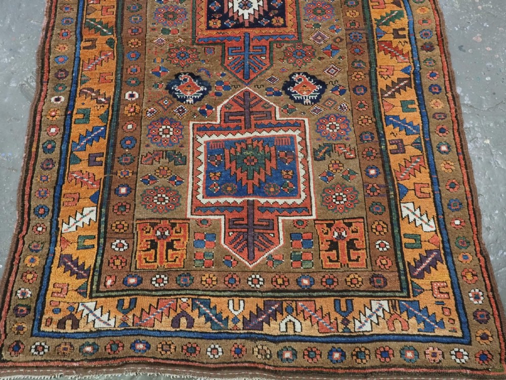 ANTIQUE KURDISH SAUJ BULAGH RUG, CAMEL GROUND, CIRCA 1880. View V