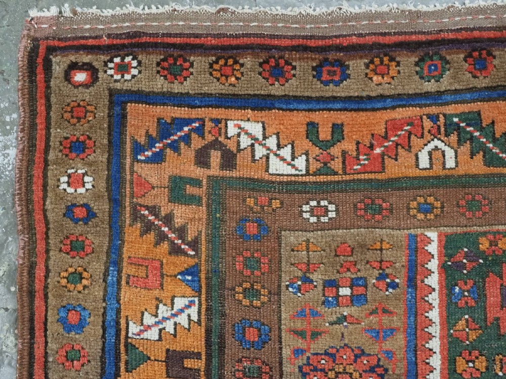 ANTIQUE KURDISH SAUJ BULAGH RUG, CAMEL GROUND, CIRCA 1880. View VI