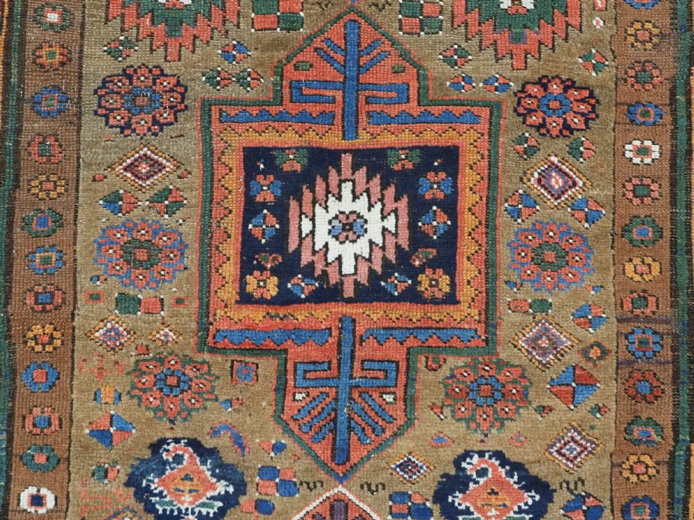ANTIQUE KURDISH SAUJ BULAGH RUG, CAMEL GROUND, CIRCA 1880. View IX