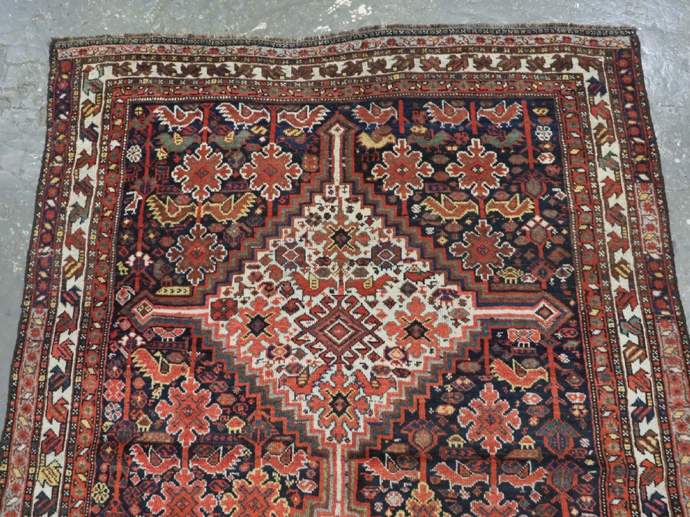 ANTIQUE TRIBAL KHAMSEH BIRD 'MORGH' RUG, LINKED MEDALLIONS, CIRCA 1900. View III