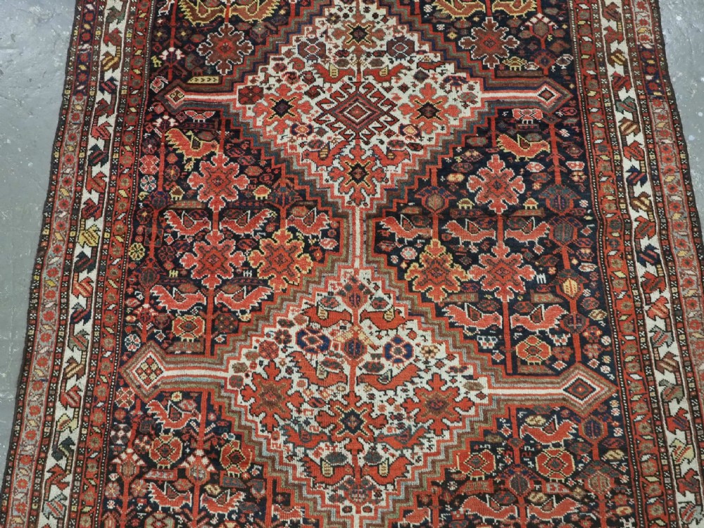 ANTIQUE TRIBAL KHAMSEH BIRD 'MORGH' RUG, LINKED MEDALLIONS, CIRCA 1900. View IV