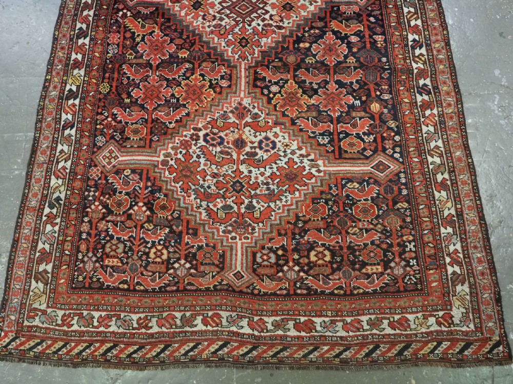 ANTIQUE TRIBAL KHAMSEH BIRD 'MORGH' RUG, LINKED MEDALLIONS, CIRCA 1900. View V