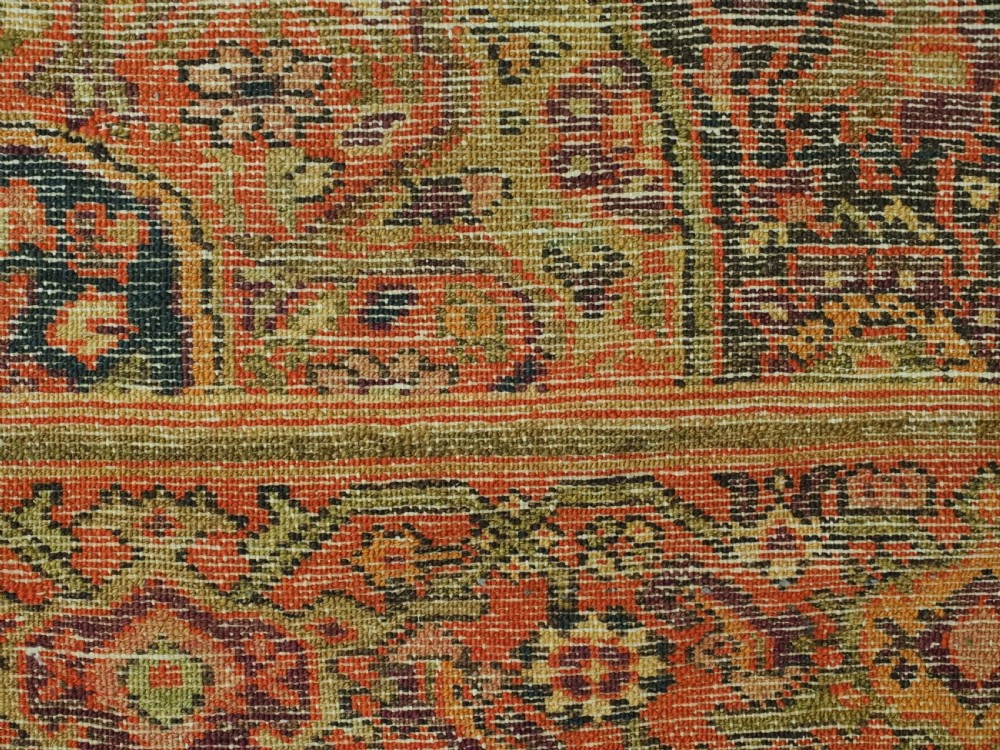 An antique hand-knotted Persian Malayer rug featuring a central terracotta medallion on a cream field with geometric patterned borders. View XIII