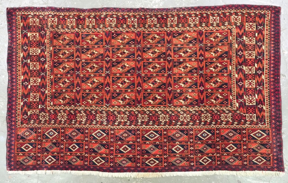 ANTIQUE TEKKE TURKMEN CHUVAL FACE WITH AINA GUL DESIGN, CIRCA 1880 OR EARLIER.