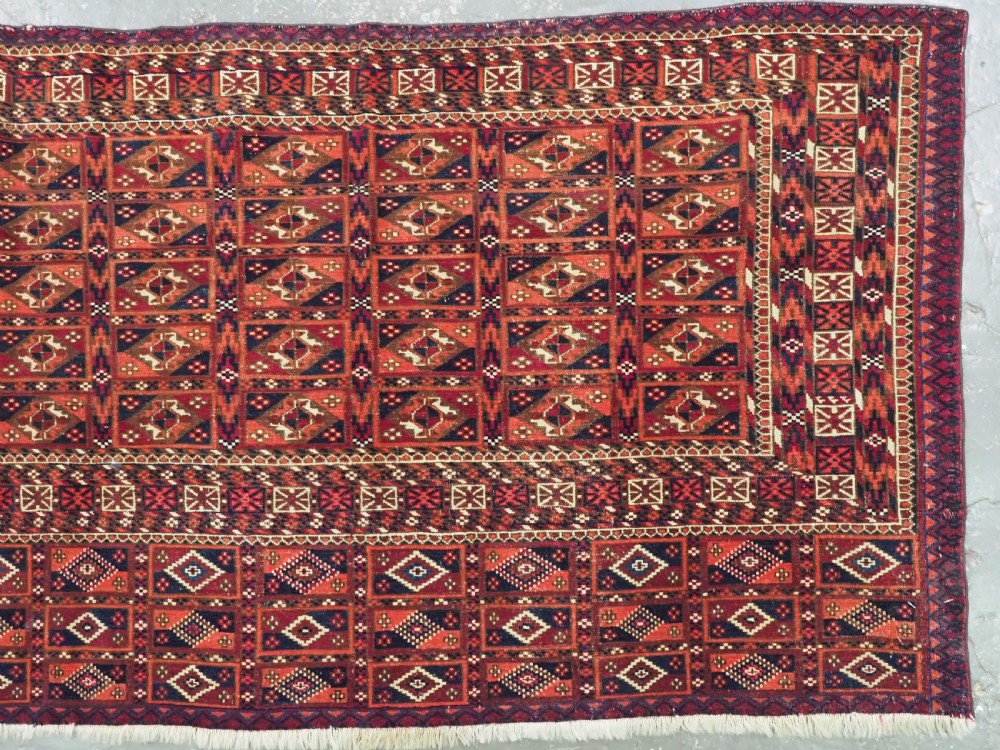 ANTIQUE TEKKE TURKMEN CHUVAL FACE WITH AINA GUL DESIGN, CIRCA 1880 OR EARLIER. View III
