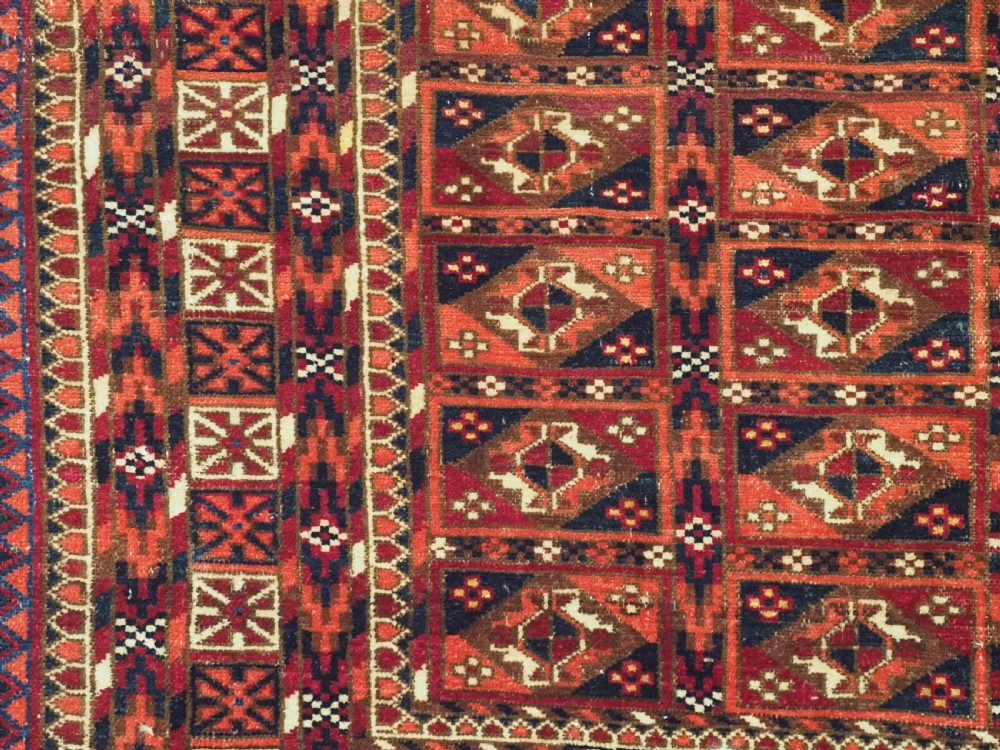 ANTIQUE TEKKE TURKMEN CHUVAL FACE WITH AINA GUL DESIGN, CIRCA 1880 OR EARLIER. View V