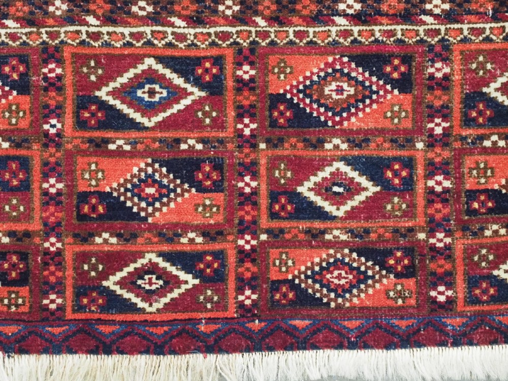 ANTIQUE TEKKE TURKMEN CHUVAL FACE WITH AINA GUL DESIGN, CIRCA 1880 OR EARLIER. View IX