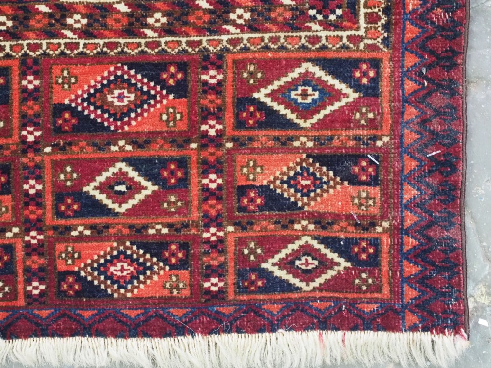 ANTIQUE TEKKE TURKMEN CHUVAL FACE WITH AINA GUL DESIGN, CIRCA 1880 OR EARLIER. View X