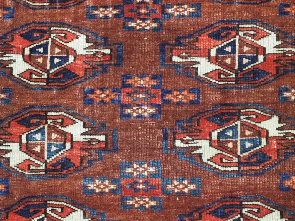 ANTIQUE YOMUT TURKMEN 16 GUL CHUVAL FACE, EXCELLENT CONDITION, CIRCA 1880. View V