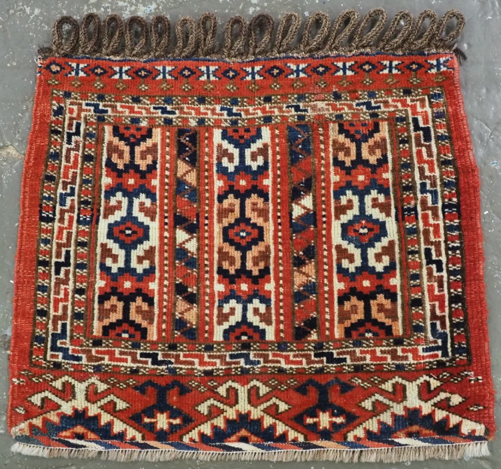 ANTIQUE YOMUT TURKMEN KAP / BAG FACE, STRIPE DESIGN, CIRCA 1900.