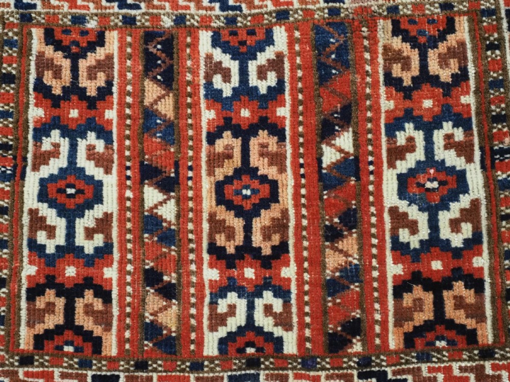 ANTIQUE YOMUT TURKMEN KAP / BAG FACE, STRIPE DESIGN, CIRCA 1900. View IV