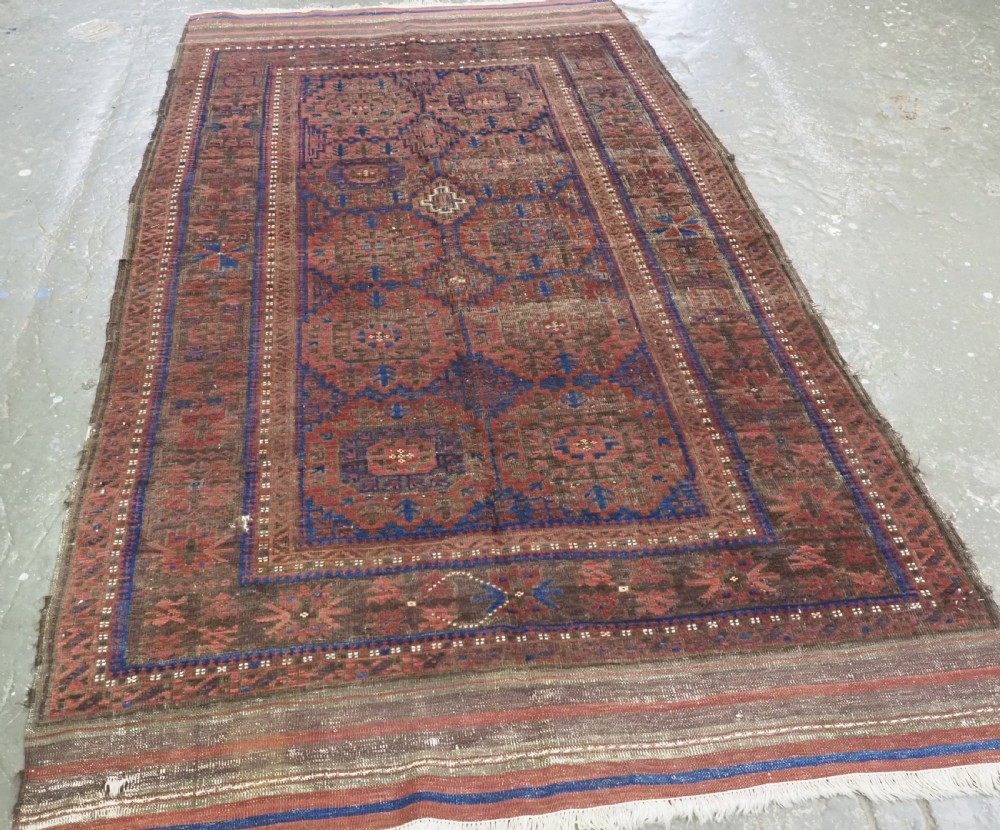 ANTIQUE TIMURI OR BALUCH TRIBAL SMALL MAIN CARPET, MEDALLION DESIGN, CIRCA 1880 OR EARLIER. View II