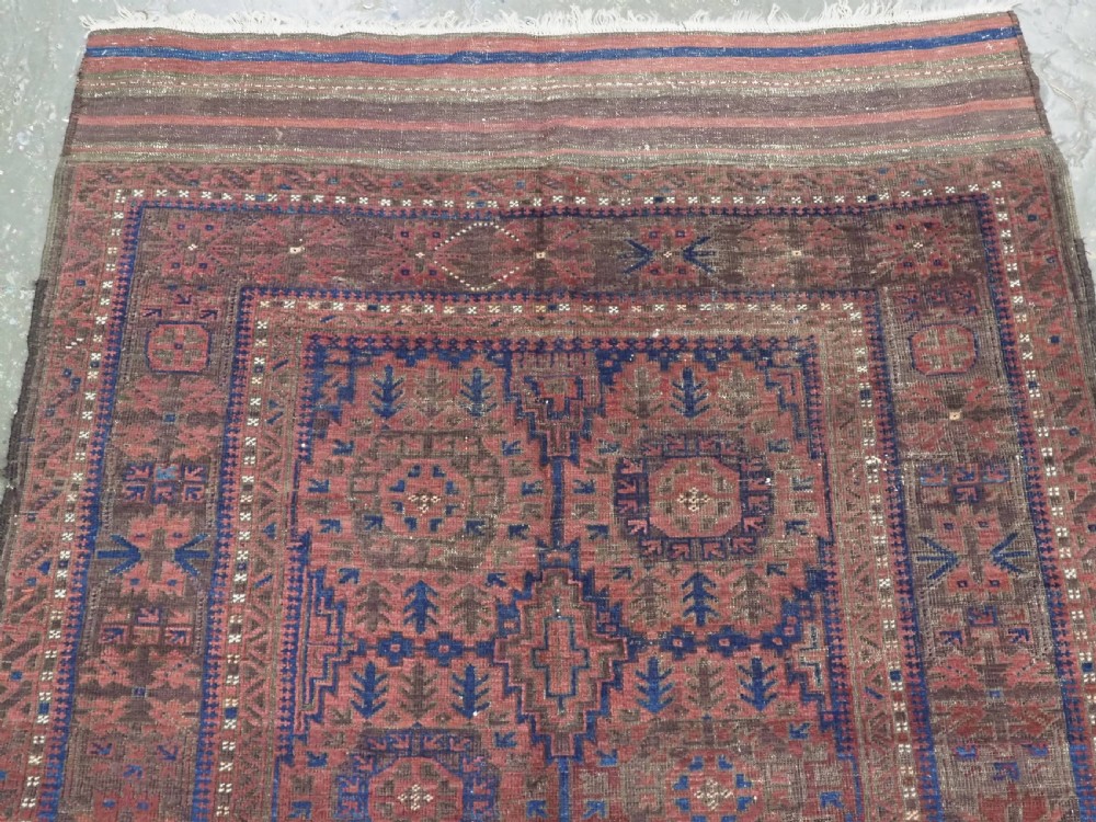 ANTIQUE TIMURI OR BALUCH TRIBAL SMALL MAIN CARPET, MEDALLION DESIGN, CIRCA 1880 OR EARLIER. View III