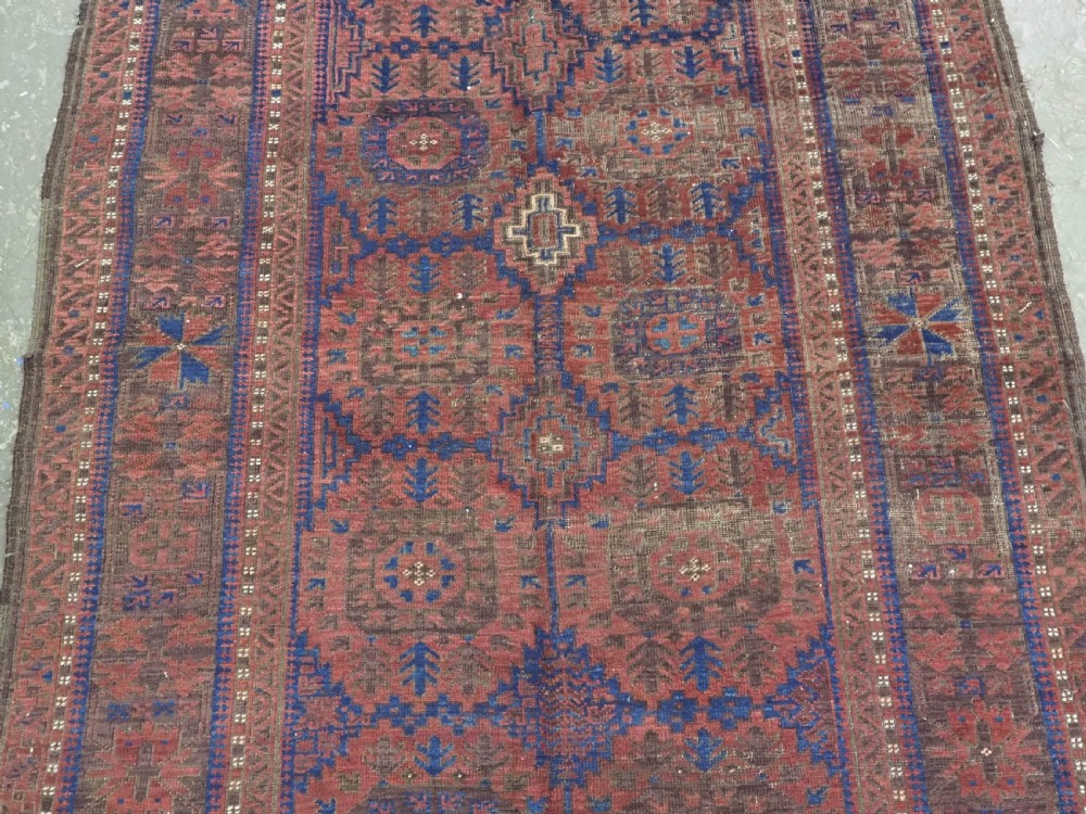 ANTIQUE TIMURI OR BALUCH TRIBAL SMALL MAIN CARPET, MEDALLION DESIGN, CIRCA 1880 OR EARLIER. View IV