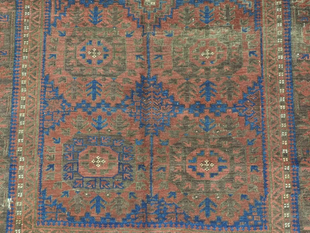 ANTIQUE TIMURI OR BALUCH TRIBAL SMALL MAIN CARPET, MEDALLION DESIGN, CIRCA 1880 OR EARLIER. View X