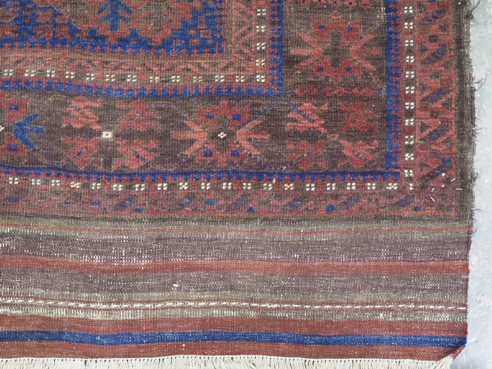 ANTIQUE TIMURI OR BALUCH TRIBAL SMALL MAIN CARPET, MEDALLION DESIGN, CIRCA 1880 OR EARLIER. View XI