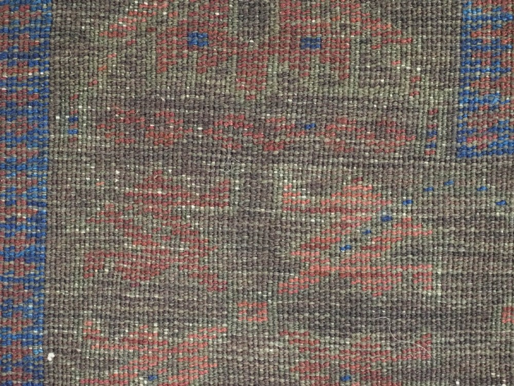 ANTIQUE TIMURI OR BALUCH TRIBAL SMALL MAIN CARPET, MEDALLION DESIGN, CIRCA 1880 OR EARLIER. View XII