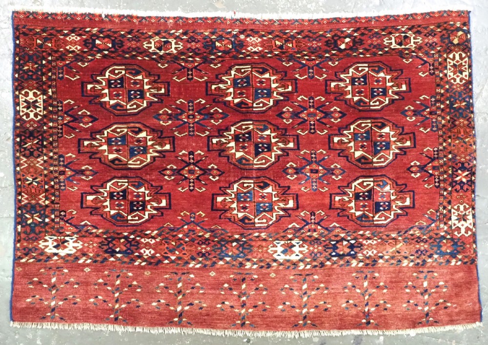 ANTIQUE ERSARI TURKMEN 9 GUL CHUVAL FACE, CIRCA 1880.