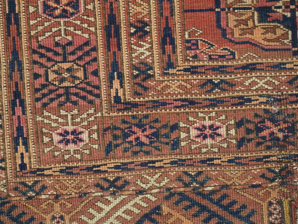 ANTIQUE TEKKE TURKMEN RUG WITH SOFT MADDER RED GROUND, CIRCA 1900. View XI