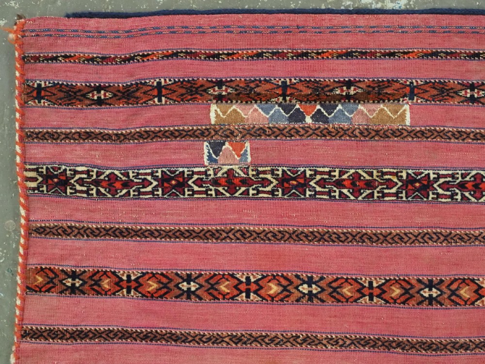 ANTIQUE TEKKE TURKMEN 'KIZIL' CHUVAL, VERY FINE WEAVE, COMPLETE WITH BACK, CIRCA 1880. View V