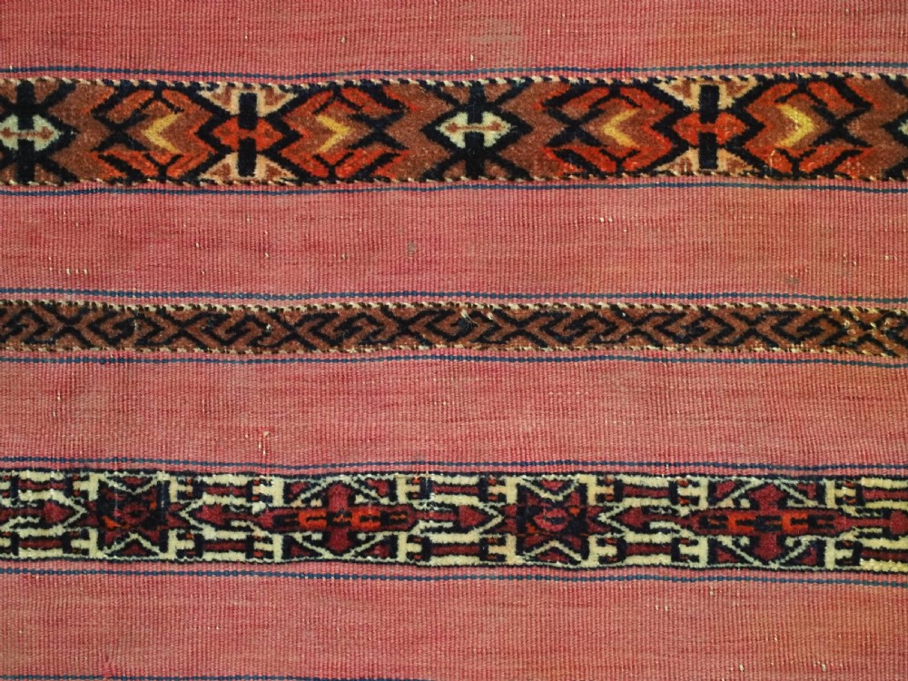 ANTIQUE TEKKE TURKMEN 'KIZIL' CHUVAL, VERY FINE WEAVE, COMPLETE WITH BACK, CIRCA 1880. View VIII
