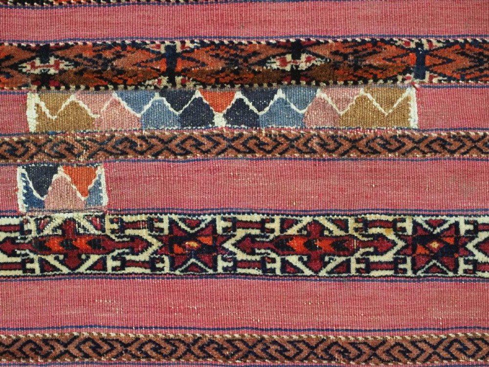 ANTIQUE TEKKE TURKMEN 'KIZIL' CHUVAL, VERY FINE WEAVE, COMPLETE WITH BACK, CIRCA 1880. View IX