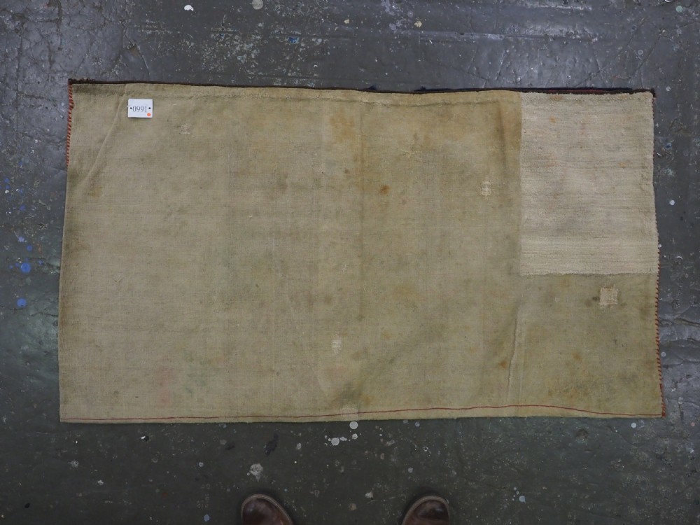 ANTIQUE TEKKE TURKMEN 'KIZIL' CHUVAL, VERY FINE WEAVE, COMPLETE WITH BACK, CIRCA 1880. View X
