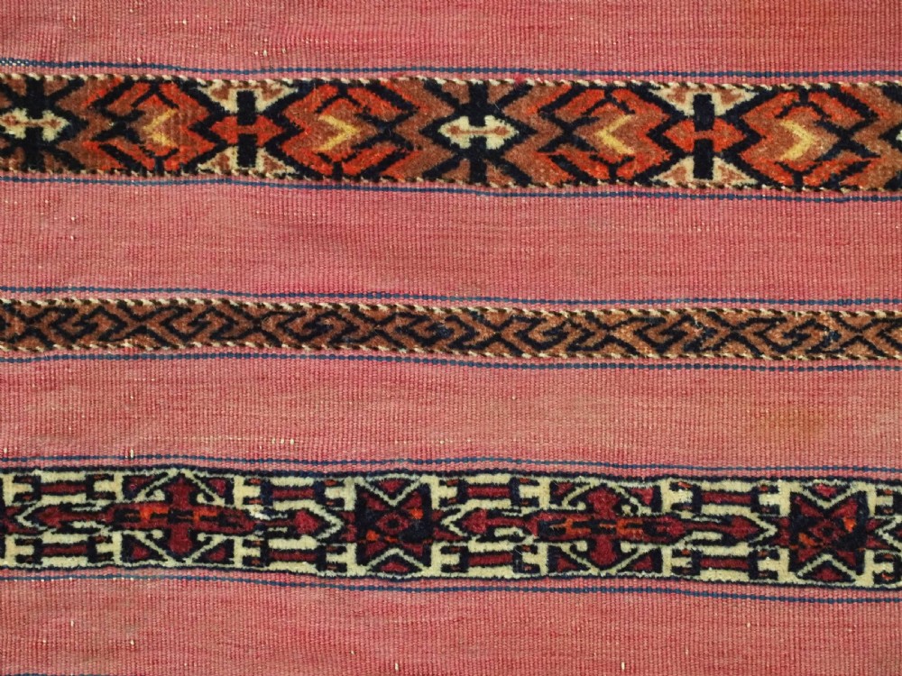 ANTIQUE TEKKE TURKMEN 'KIZIL' CHUVAL, VERY FINE WEAVE, COMPLETE WITH BACK, CIRCA 1880. View XI