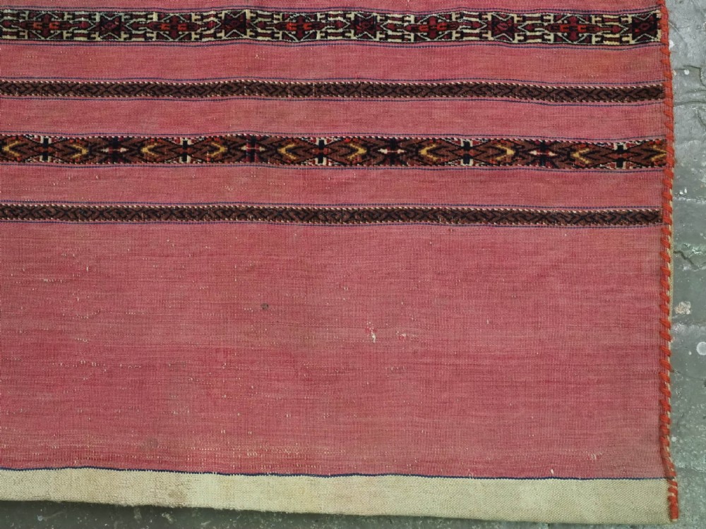 ANTIQUE TEKKE TURKMEN 'KIZIL' CHUVAL, VERY FINE WEAVE, COMPLETE WITH BACK, CIRCA 1880. View XII