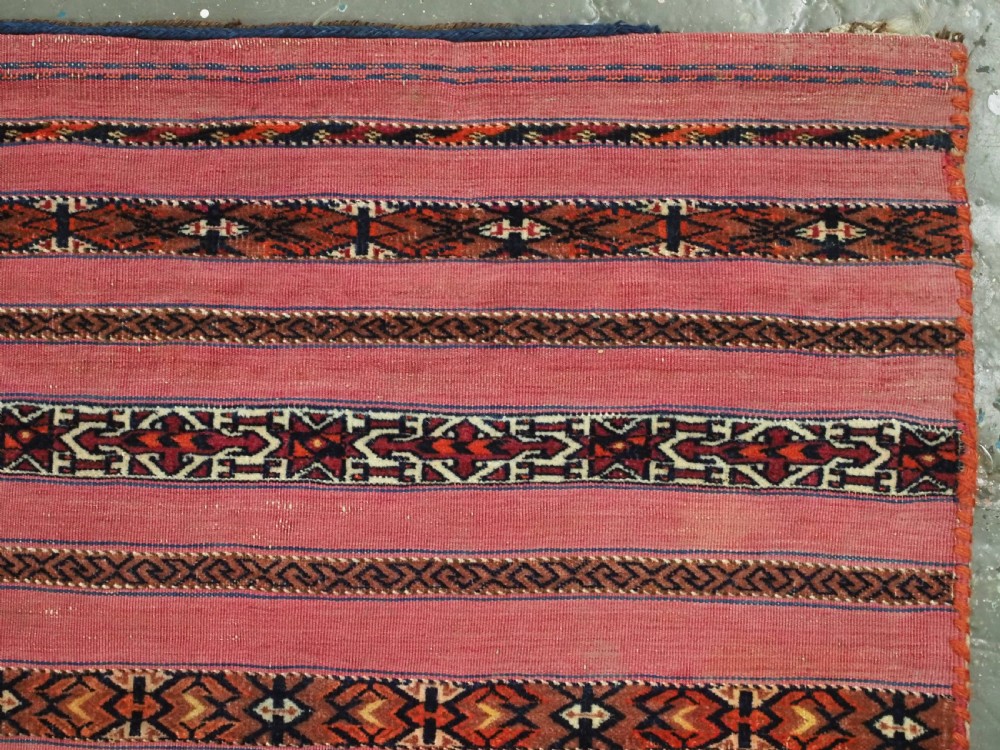 ANTIQUE TEKKE TURKMEN 'KIZIL' CHUVAL, VERY FINE WEAVE, COMPLETE WITH BACK, CIRCA 1880. View XIII