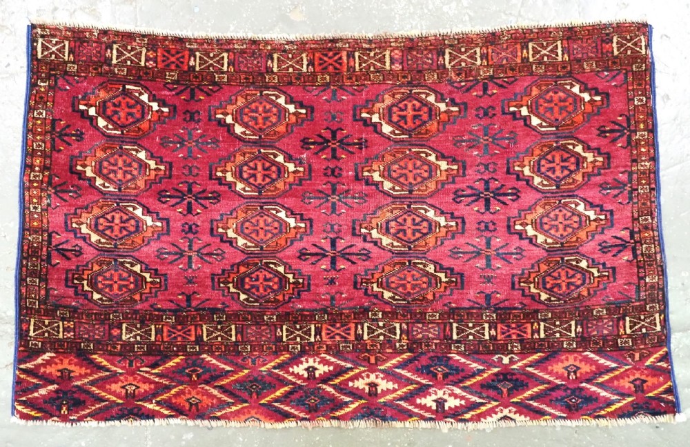 ANTIQUE TEKKE (SARYK) TURKMEN 16 GUL CHUVAL FACE, SCARCE COCHINEAL FIELD COLOUR, CIRCA 1880.