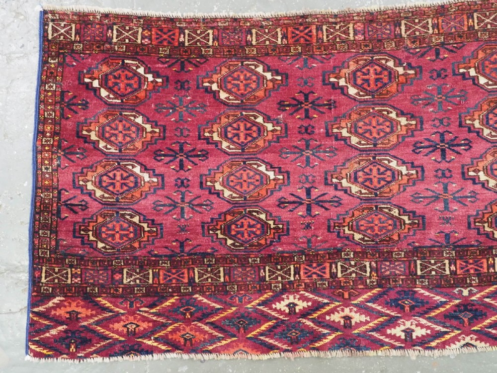 ANTIQUE TEKKE (SARYK) TURKMEN 16 GUL CHUVAL FACE, SCARCE COCHINEAL FIELD COLOUR, CIRCA 1880. View II