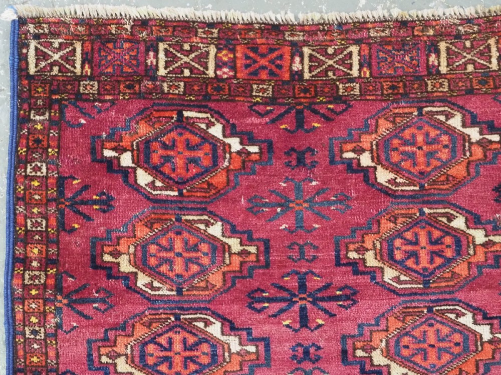 ANTIQUE TEKKE (SARYK) TURKMEN 16 GUL CHUVAL FACE, SCARCE COCHINEAL FIELD COLOUR, CIRCA 1880. View IV