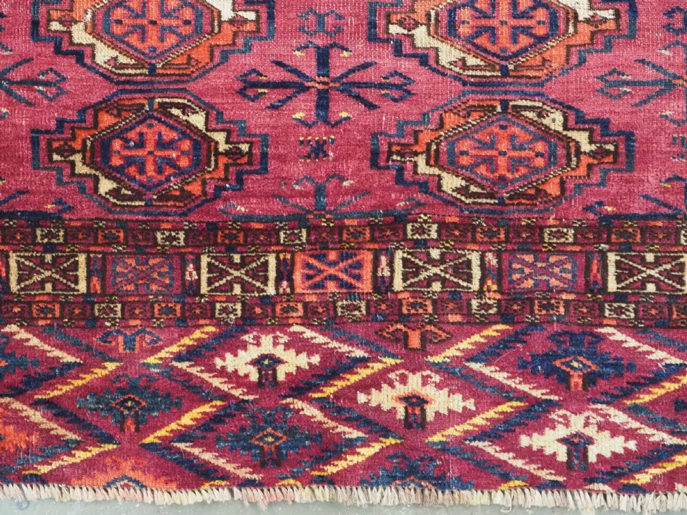 ANTIQUE TEKKE (SARYK) TURKMEN 16 GUL CHUVAL FACE, SCARCE COCHINEAL FIELD COLOUR, CIRCA 1880. View V