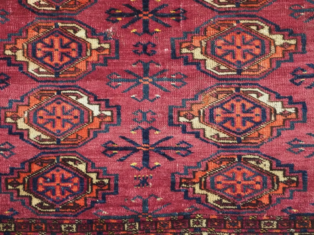 ANTIQUE TEKKE (SARYK) TURKMEN 16 GUL CHUVAL FACE, SCARCE COCHINEAL FIELD COLOUR, CIRCA 1880. View VI